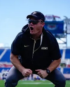 Conor Hughes, Army West Point football strength coach, on the sideline